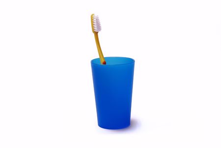 Toothbrush in a color holderの写真素材