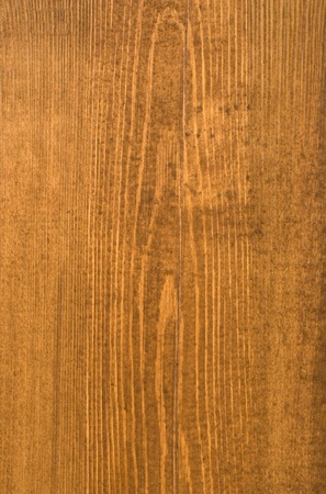 Structure of a fragment of a wall from boards painted with a brown paint.の写真素材