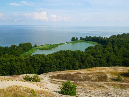 panoramic view of lake, sea and sand duneの写真素材