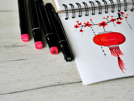 chinese lantern sketch with markers wooden backgroundの写真素材