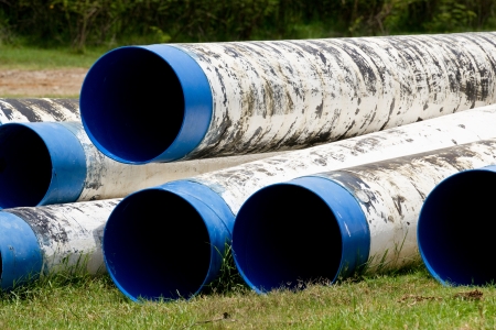 pipe line that laid through green fieldの写真素材