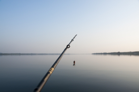 Fishing in a lakeの写真素材