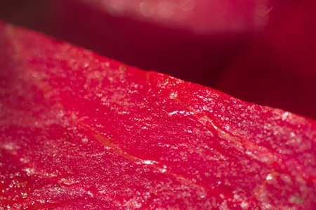 Red beets, boiled and cut into large chunks, juicy, wet, after being taken out of the water - large magnification, details.の写真素材