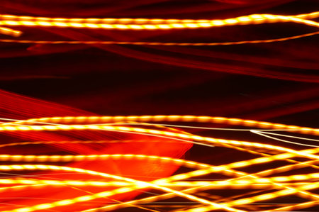 Neon lights - warm-colored light effects on a black background