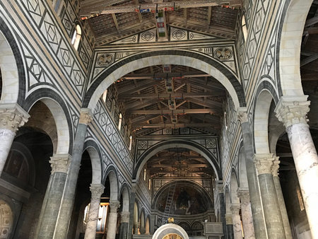 Florence, Tuscany, Italy - 07/14/2018: Basilica of San Miniato al Monte and the cemetery adjacent to...