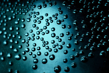blue Magical air bubbles in a dark space with a metallic glow