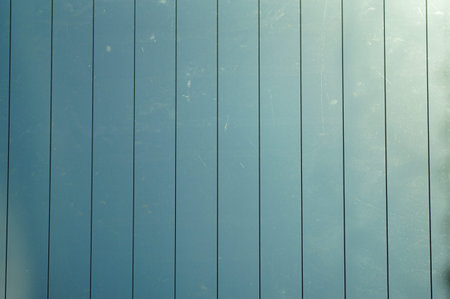 Blue, blurry, abstract background, with light and dark places.