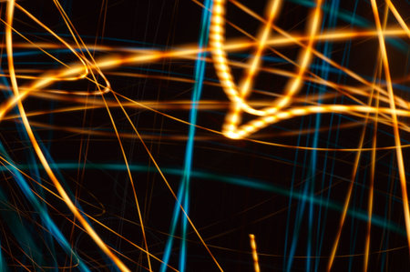 abstract graphic background showing azure irregular lines and chaotic ribbons.
