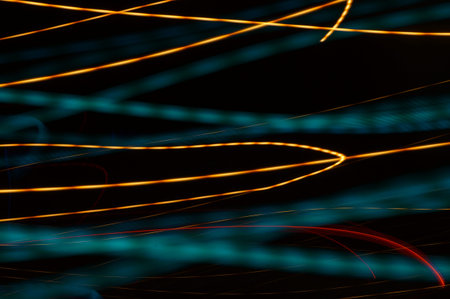 abstract graphic background showing azure irregular lines and chaotic ribbons.