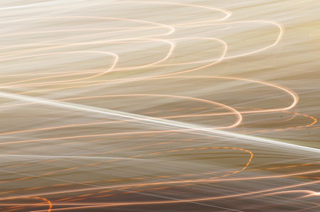 white luminous thread on black background. Irregular color graphic snakes. Bright color lines.の写真素材