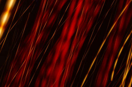 Luminous streamer - neon bright lines on black background.の写真素材
