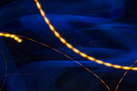 Luminous fog - blue mysterious glow with gold string.の写真素材