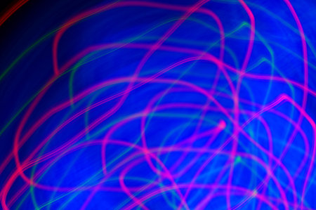 Blue fog on black background with red smudges. Luminous fog, blue glow with red lines. Black...