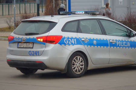 Accident involving streetcar and passenger - police, medical and traffic police cars. The place of the incident in Krakow - streetcar terminus Maly PÅaszow. Krakow, Poland - 03/11/2021のeditorial素材
