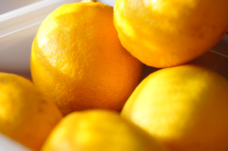 Ripe lemons in the refrigerator. Close-up. Selective focus.の写真素材