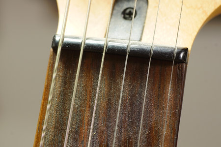 Detail of the fretboard of an electric guitar, close-upの写真素材
