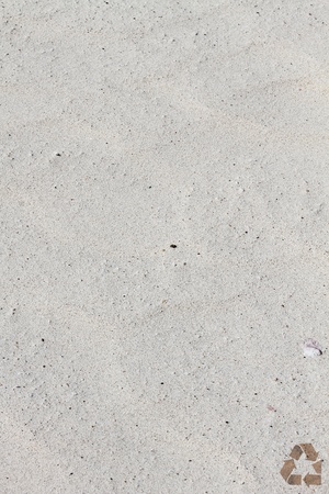 sand texture with recycle symbolの写真素材