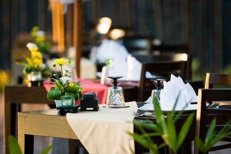the dining table was decorated with the flower for the romantic timeの写真素材