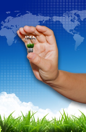Idea in hand on nature backgroundの写真素材