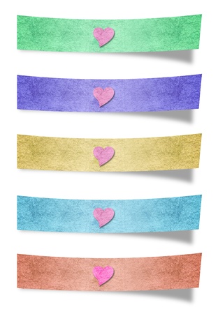 recycled paper stick and love symbol on white backgroundの写真素材