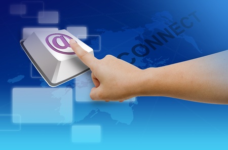 hand pushing a button on a touch screen interface connect to worldwideの写真素材