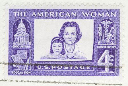This is a Vintage 1960 canceled US stamp The American Womanの写真素材