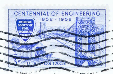 USA - CIRCA 1952: A stamp printed by USA shows the centennial of engineering depicting two bridges, circa 1952の写真素材