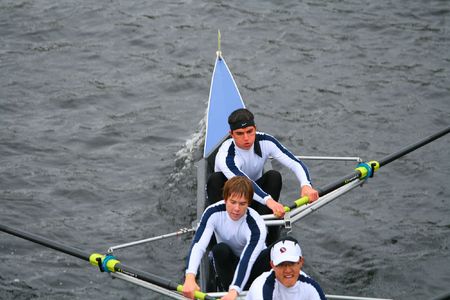 BOSTON - OCTOBER 18: University Men's rowing team competes in the Head Of The Charles Regatta on October 18, 2009 in Boston, Massachusetts.のeditorial素材
