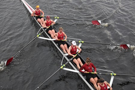 BOSTON - OCTOBER 24: Bates College Women's Crew  competes in the Head of the Charles Regatta  on October 24, 2010 in Boston, Massachusetts. のeditorial素材