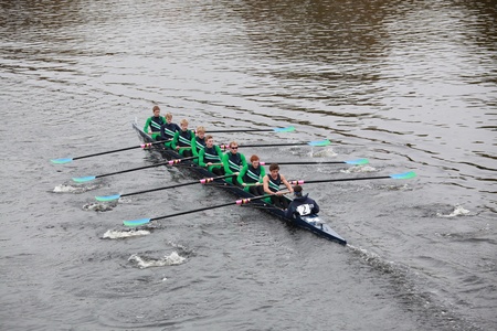 BOSTON - OCTOBER 24: New Trier High School Rowing Men 18 and Under men's Crew competes in the Head of the Charles Regatta on October 24, 2010 in Boston, Massachusetts. のeditorial素材