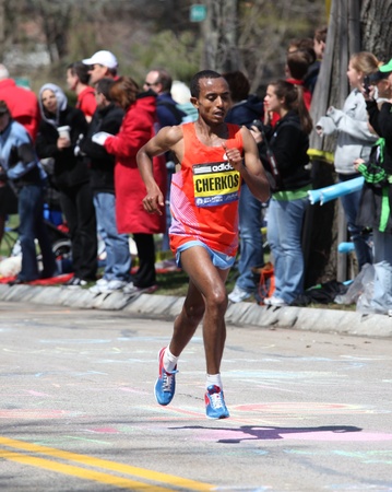 BOSTON - APRIL 18: Elite Women runners races up the Heartbreak Hill during the Boston Marathon April 18, 2011 in Boston. Caroline Kilel (Kenya) won the womens category with 2:22:36. のeditorial素材