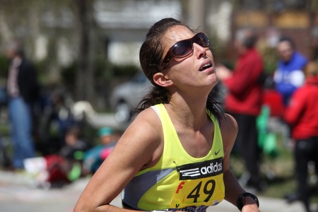  BOSTON - APRIL 18 : Nearly 25000 runners participated in the Boston Marathon on April 18, 2011 in Boston. Geoffrey Mutai (Kenya) finished first with a time of 2:03:02. のeditorial素材