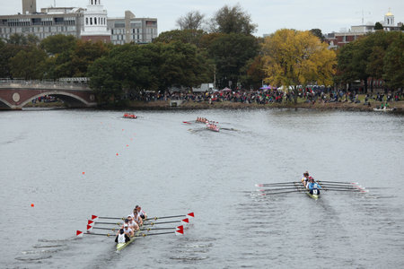 BOSTON - OCTOBER 23: Many teams race in the Head of Charles Regatta making the turn before the Weeks...