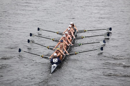 BOSTON - OCTOBER 23: Georgetown University Women  Eights races in the Head of Charles Regatta. Williams College won with a time of 14:17 on October 23, 2011 in Boston, MA.のeditorial素材