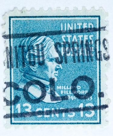 UNITED STATES - CIRCA 1938   A stamp printed in United States  Displays the profile of President Millard Fillmore with a post mark from Manatou Springs Colorado  United States - circa 1938 のeditorial素材