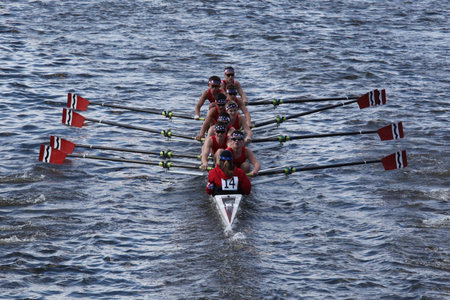 BOSTON - OCTOBER 21 Community Rowing races in the Head of Charles Regatta, Marin Rowing Association won with a with a time of 12:59 on October 21, 2012 in Boston, MA. のeditorial素材