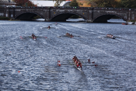 BOSTON - OCTOBER 21 Wayland-Weston Rowing Association races in the Head of Charles Regatta, Marin Rowing Association won with a with a time of 12:59 on October 21, 2012 in Boston, MA. のeditorial素材