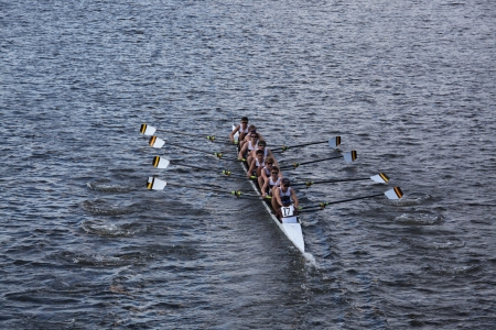 BOSTON - OCTOBER 21 Brunswick School Boat Club races in the Head of Charles Regatta, Marin Rowing Association won with a with a time of 12:59 on October 21, 2012 in Boston, MA. のeditorial素材