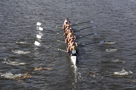 BOSTON - OCTOBER 21 Jesuit College Prep races in the Head of Charles Regatta, Marin Rowing Association won with a with a time of 12:59 on October 21, 2012 in Boston, MA. のeditorial素材