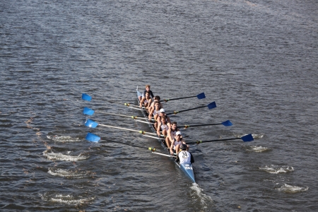 BOSTON - OCTOBER 21 Choate Rosemary High School races in the Head of Charles Regatta, Marin Rowing Association won with a with a time of 12:59 on October 21, 2012 in Boston, MA. のeditorial素材