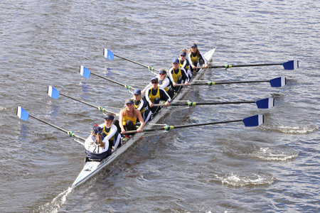 BOSTON - OCTOBER 18, 2015: Long Beach Junior Crew races in the Head of Charles Regatta Women's Youth Eightsのeditorial素材
