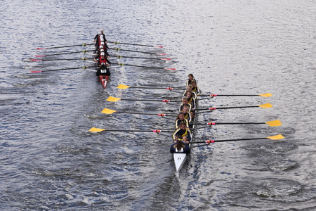 BOSTON - OCTOBER 18, 2015: CRI left and Merion Mercy right races in the Head of Charles Regatta Women's Youth Eightsのeditorial素材