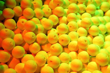 Anti moth ball texture in yellow and green lightの写真素材