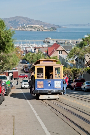 SAN FRANCISCO - NOVEMBER 2012: The Cable car tram, November 2nd, 2012 in San Francisco, USA. The San Francisco cable car system is world last permanently manually operated cable car system. Lines were established between 1873 and 1890.のeditorial素材