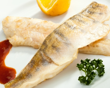 Grilled Pike perch with lemon and tomato sauceの写真素材