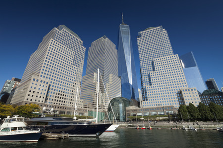 New York, USA-September 27, 2014:Tall ships docked at the North Cove Marina at Battery Park in Manhattan and financial center panoramaのeditorial素材