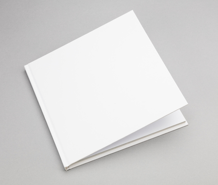 Blank book with ajar white coverの写真素材