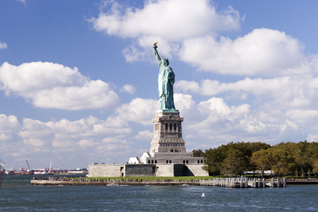 USA, NEW YORK, OCTOBER 8, 2014: Statue of Liberty at New York City is given the USA by France in 1885, standing at Liberty Island at Hudson river in New York.のeditorial素材