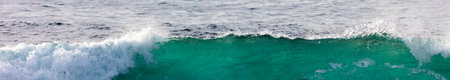Big wave break spray in the Pacific Ocean
