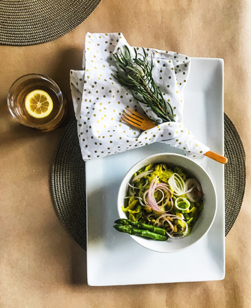 Vegeable salad as breakfast with asparagus and avocadoの写真素材